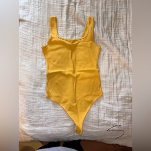 Yellow bodysuit